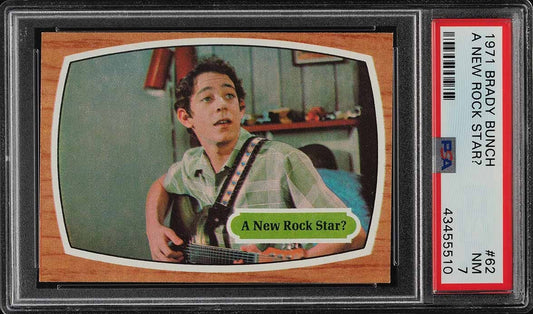 1971 Topps Brady Bunch Trading Card #62 (PSA 7 NM) A New Rock Star?0